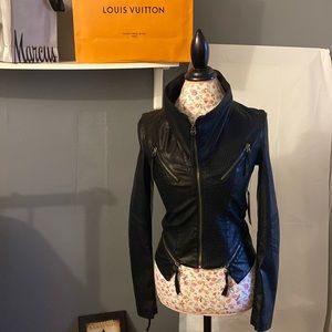 Faux leather jacket biker design with zippers up top and bottom for unique look